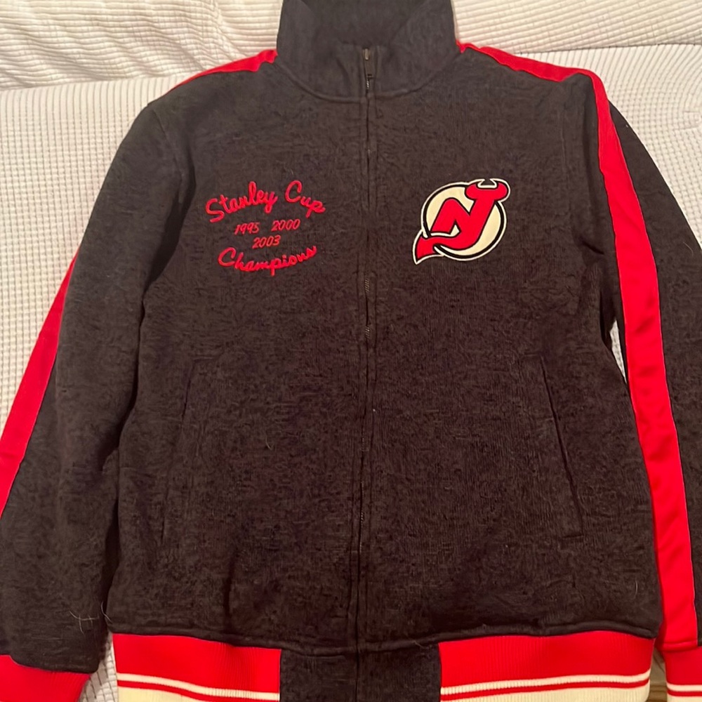 DEVILS CCM STANLEY CUP CHAMPIONS 1995,2000,AND 2003.